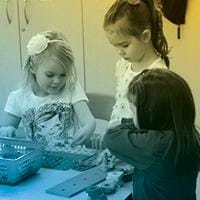 A group of girls making crafts