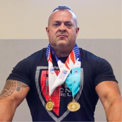 Trevor Davis wearing medals