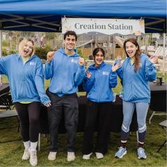 4 WSPR events staff in front of the creative station event tent